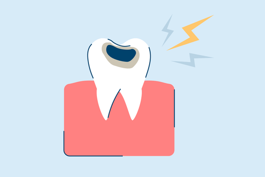 an illustration of a tooth with a cavity
