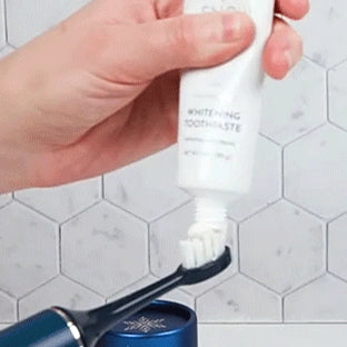 Woman using Snow Gold Teeth Whitening Pen – at-home solution for a brighter smile